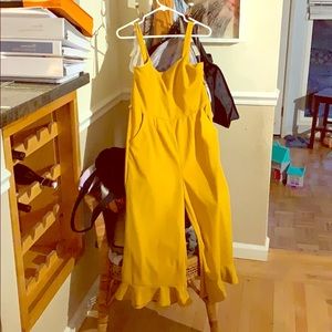 Size XL yellow romper, fits more like a large.